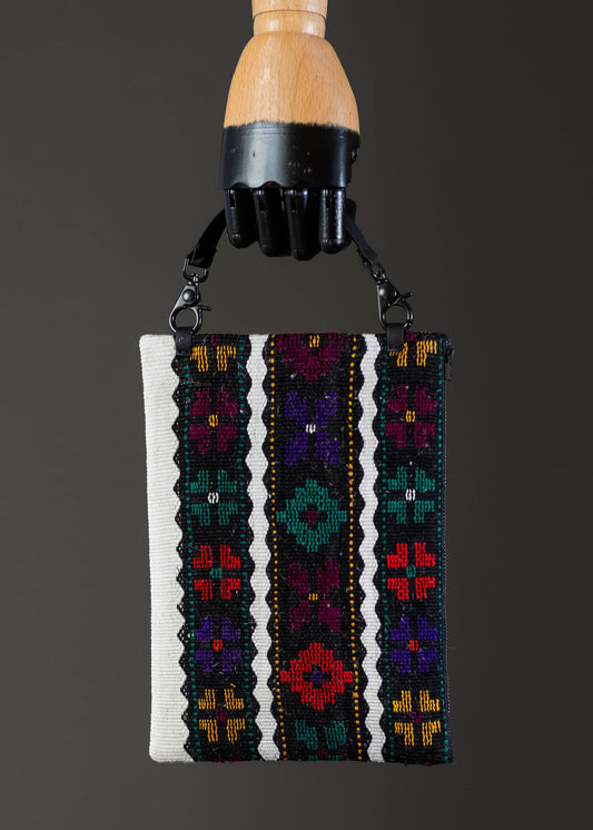 Front view of FTLO bag with colorful floral and striped vintage handwoven patterns.