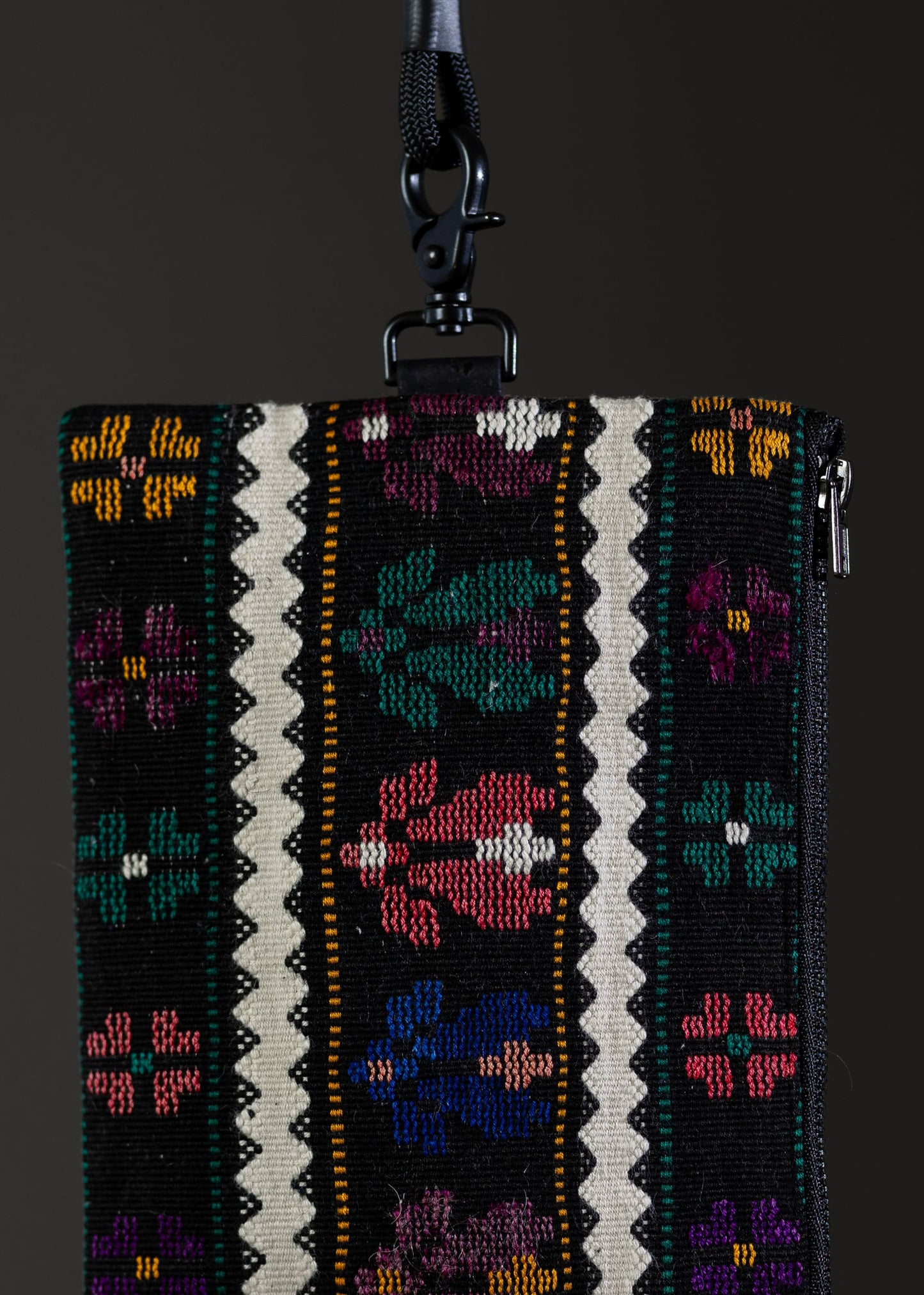 Detailed motif view of FTLO bag revealing the craftsmanship of the abstract floral design.
