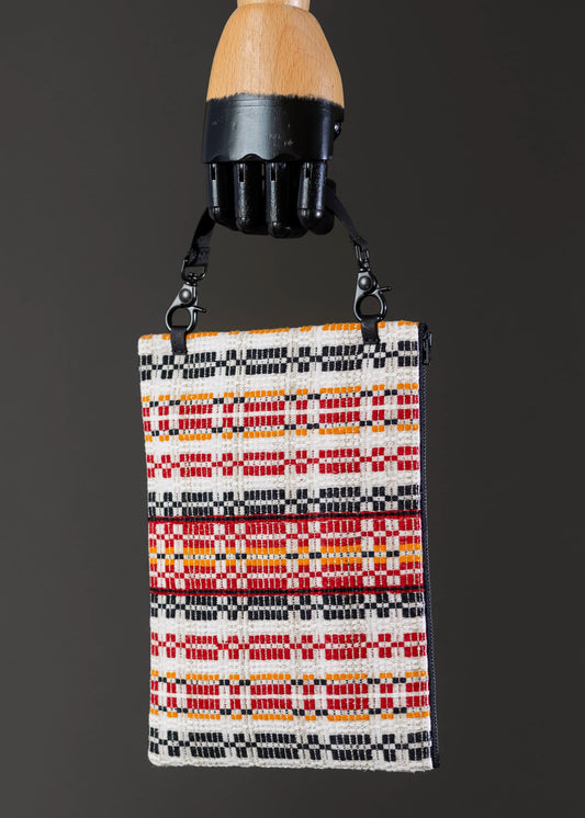 Front view of FTLO bag with yellow grid pattern on vintage handwoven textile.
