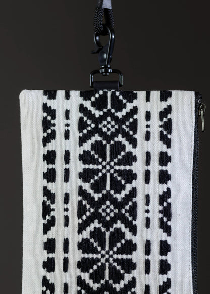 Close-up of FTLO bag highlighting the intricate black and white geometric motif.