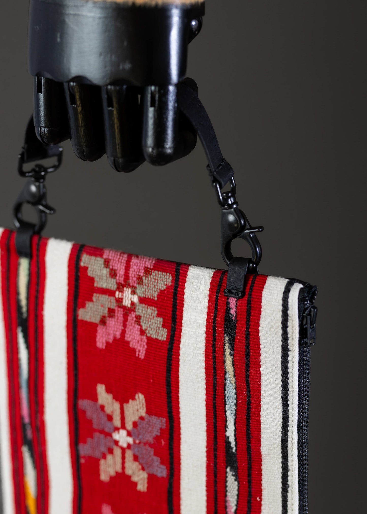 Detailed image showing the intricate handwoven floral patterns on FTLO red stripe bag.