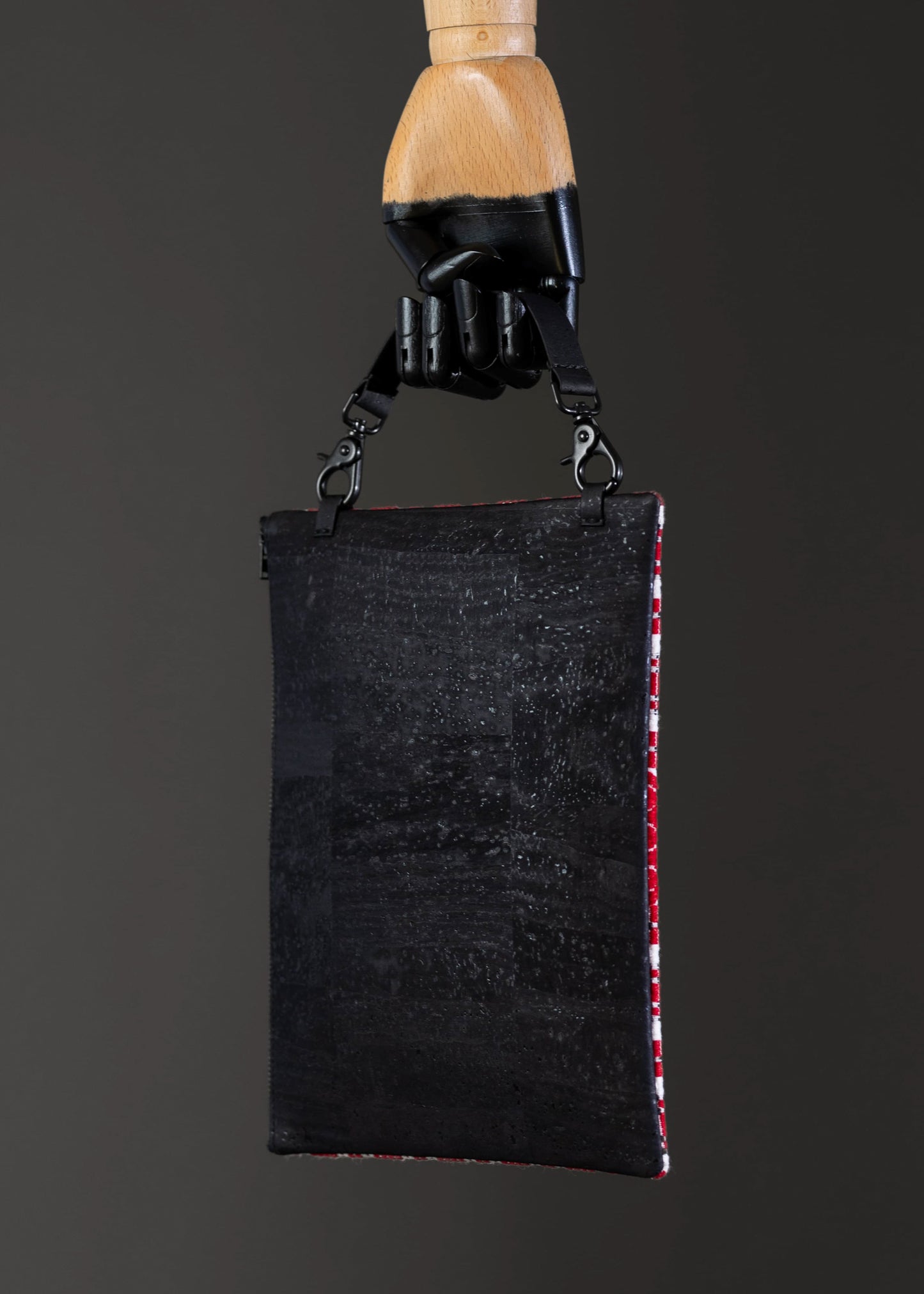 FTLO red geometric pattern bag showcasing the black cork fabric on the back.