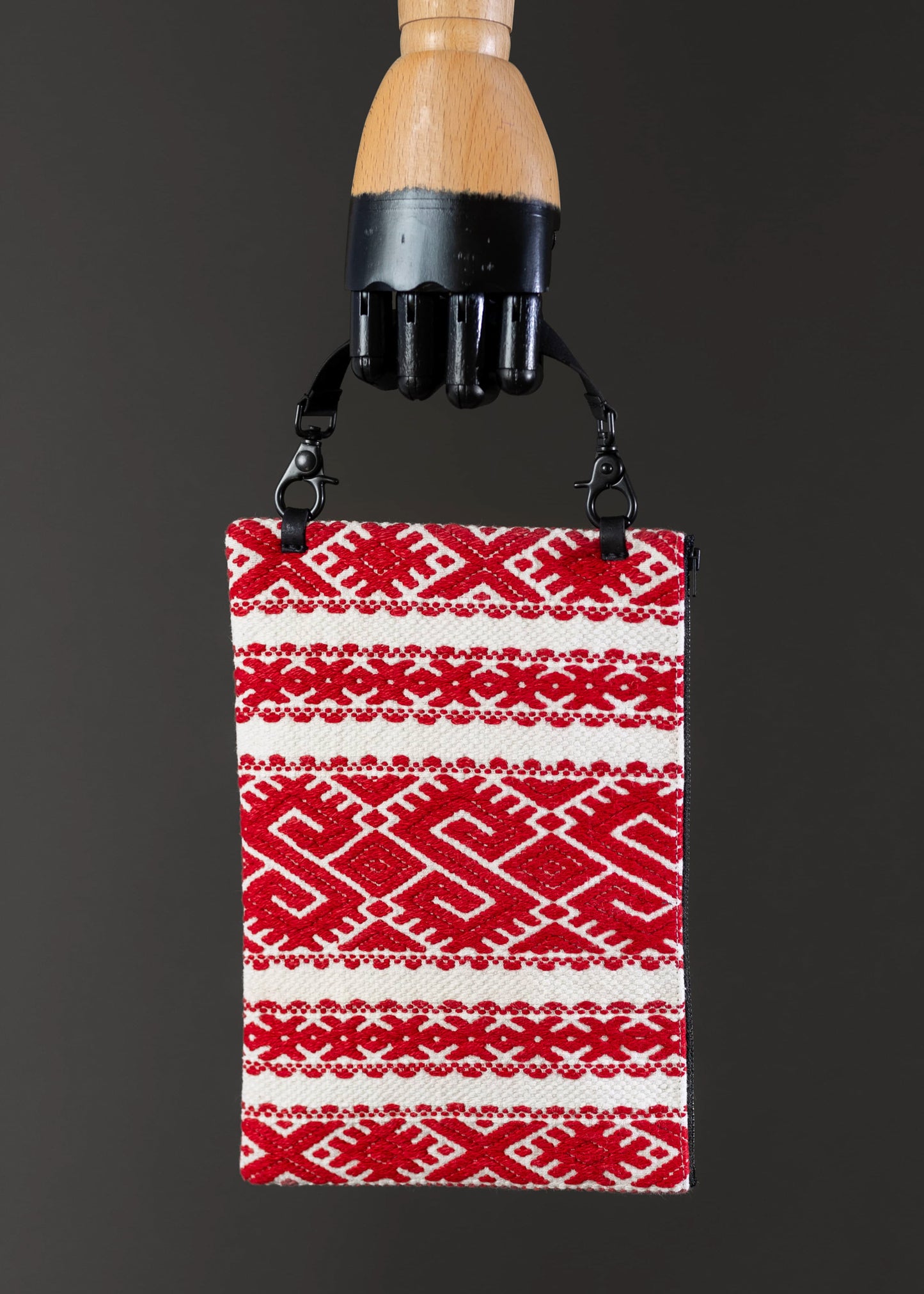 Front view of FTLO red and white geometric pattern vintage Romanian handwoven bag.