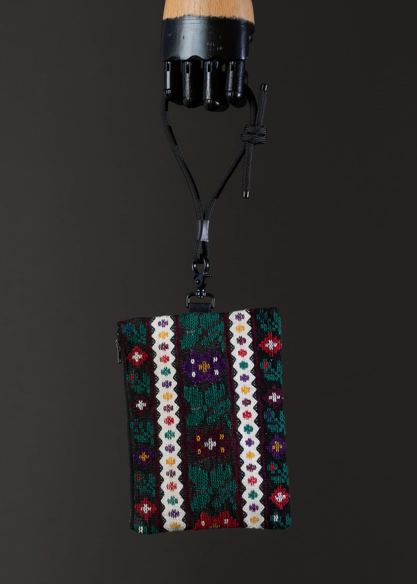 Front view of the small FTLO bag with a rich, multicolor floral pattern.