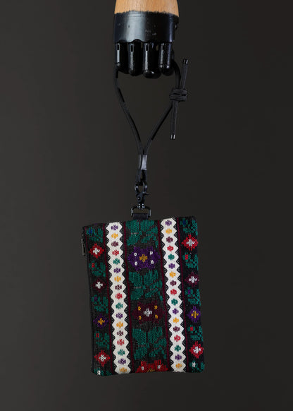 Front view of the small FTLO bag with a rich, multicolor floral pattern.