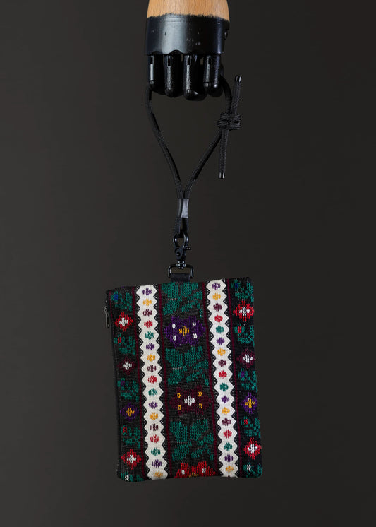 Front view of the small FTLO bag with a rich, multicolor floral pattern.